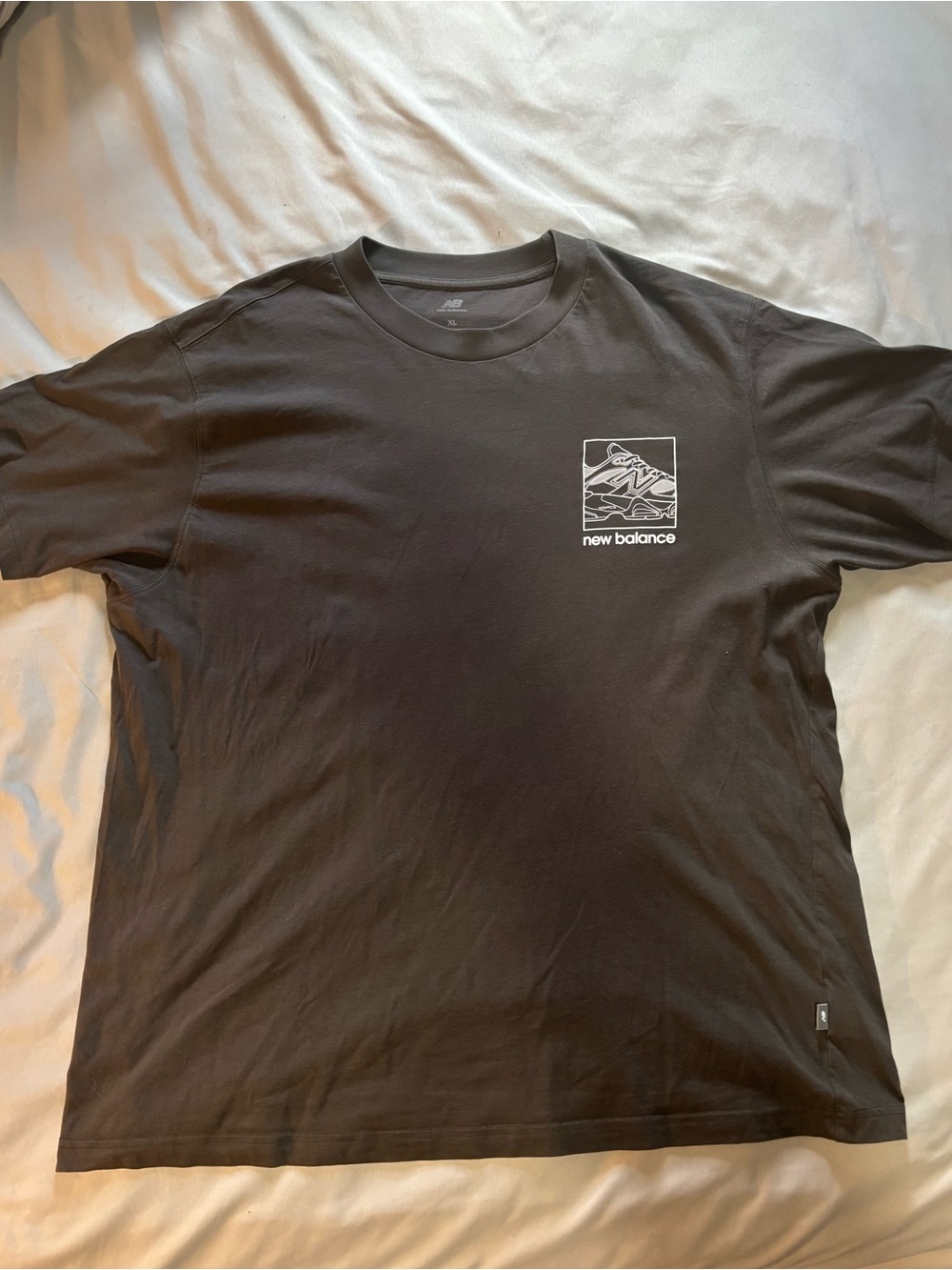 New Balance 9060 Black Short Sleeve Tee with White Logo Graphic